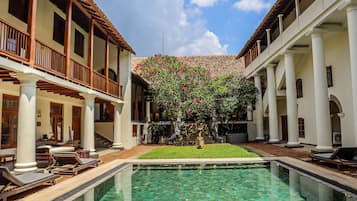 Outdoor pool, sun loungers