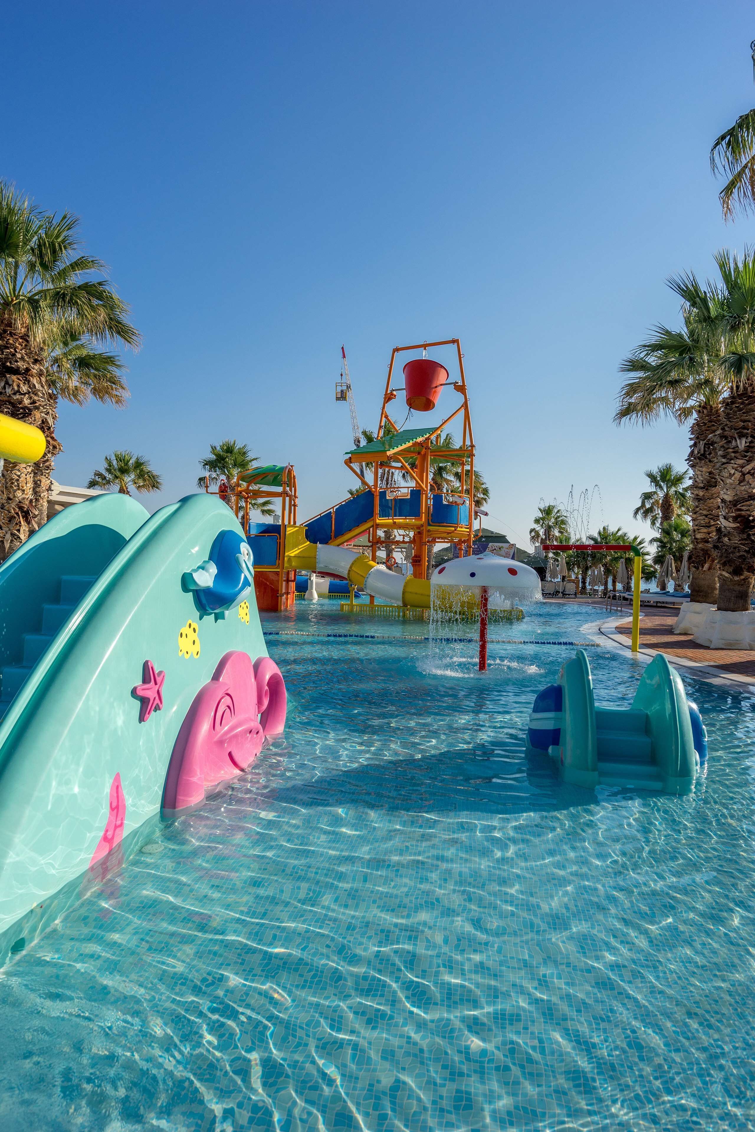 A water park with slides and a water play area.