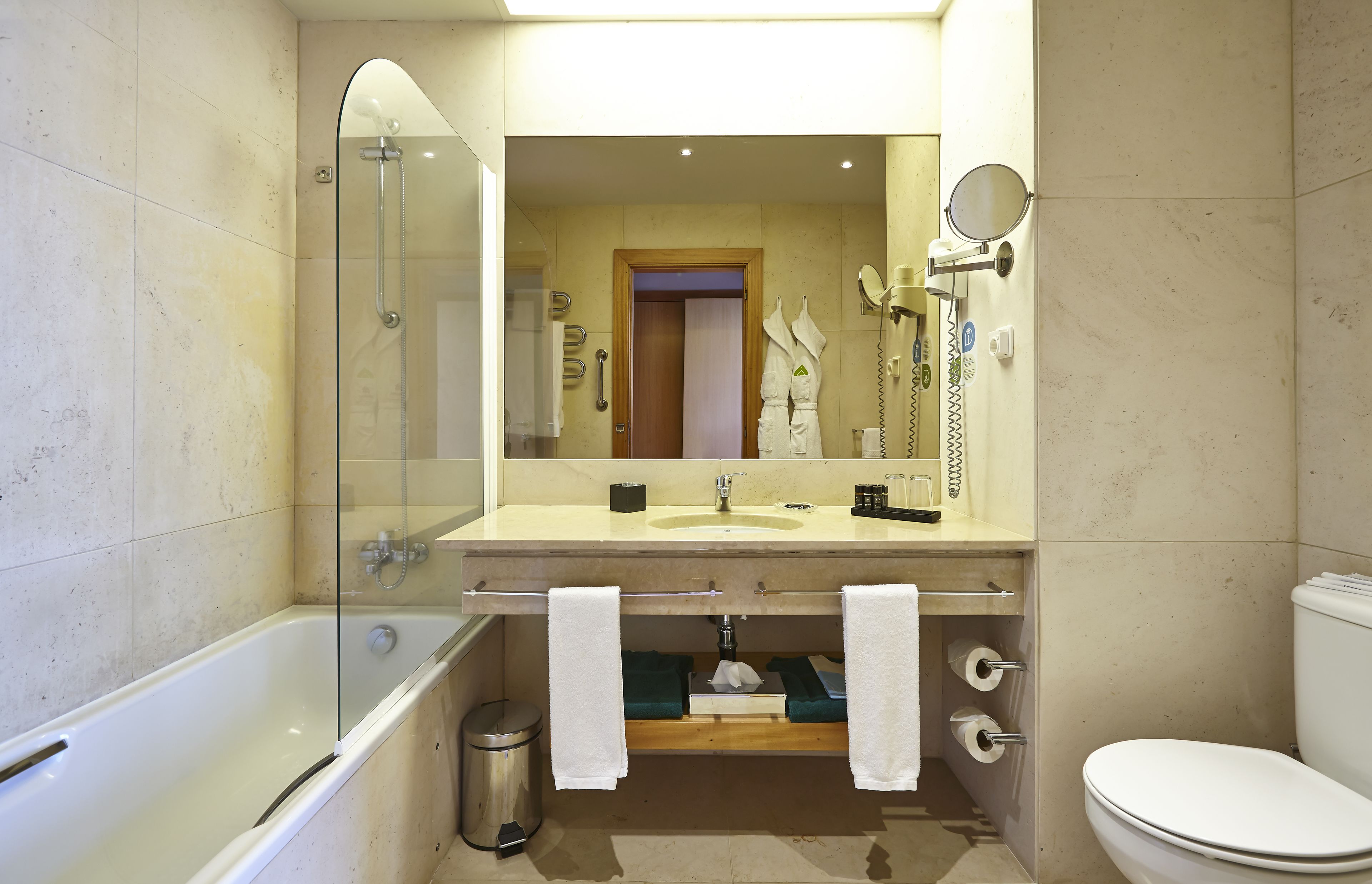 bathtub, free toiletries, hair dryer, bathrobes