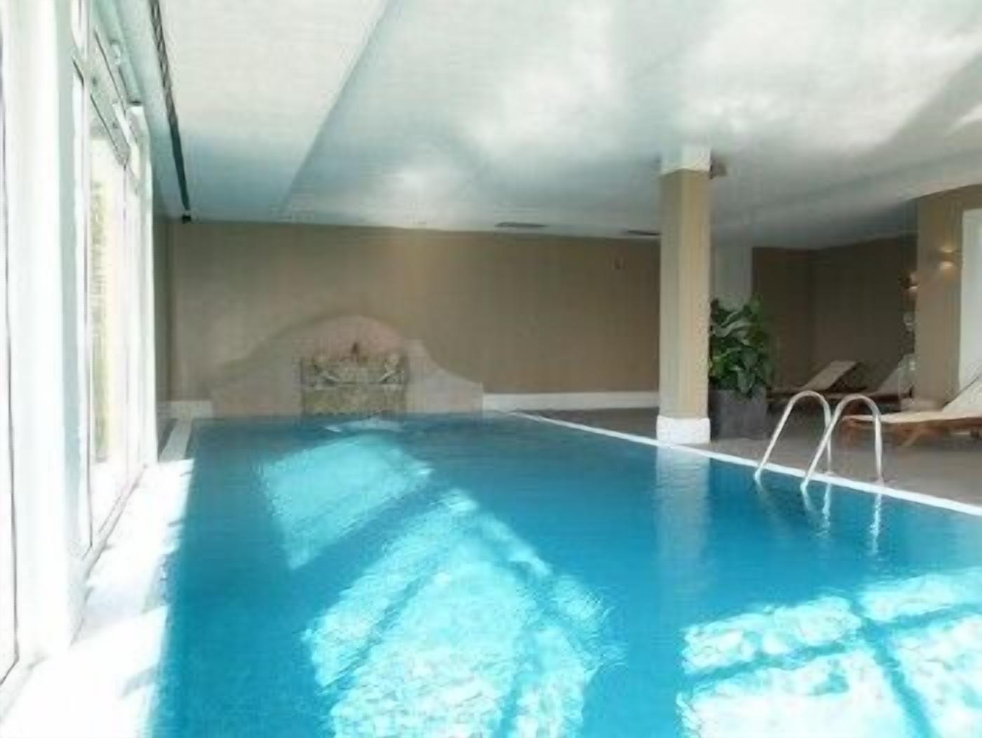 indoor pool, pool loungers
