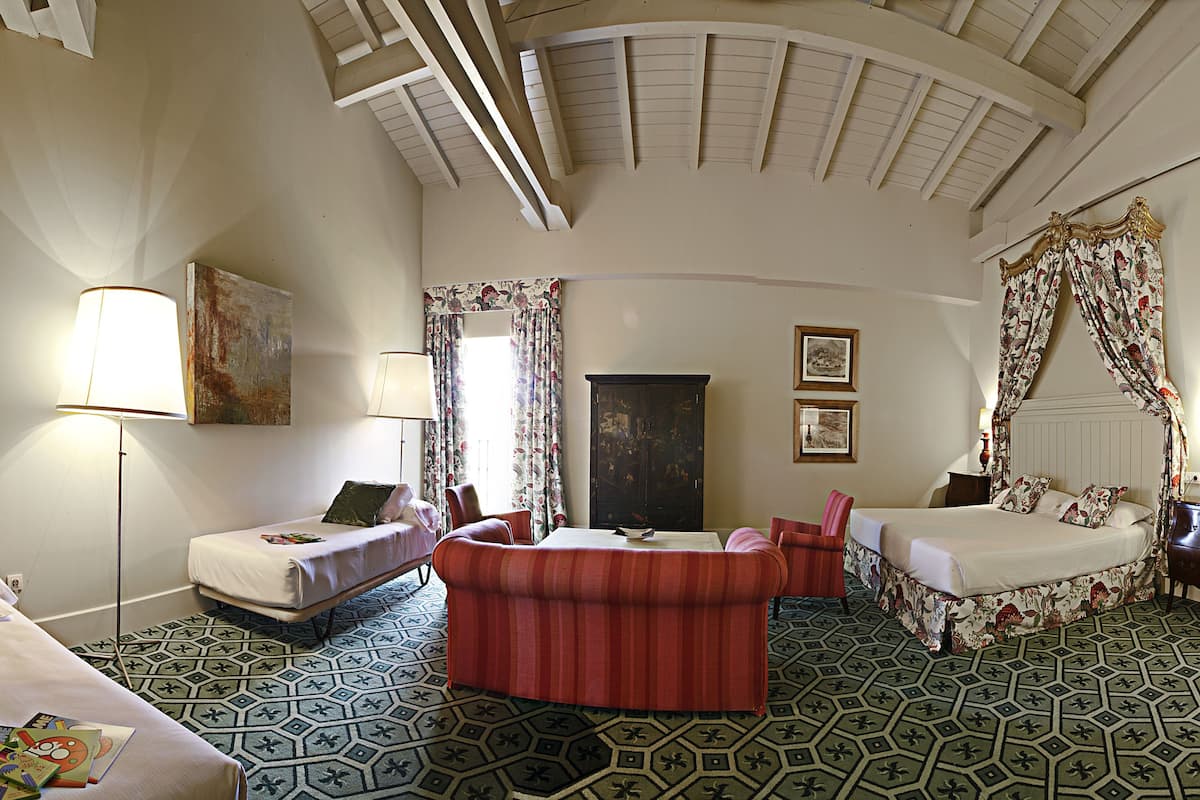 family room | in-room safe, desk, blackout curtains, soundproofing