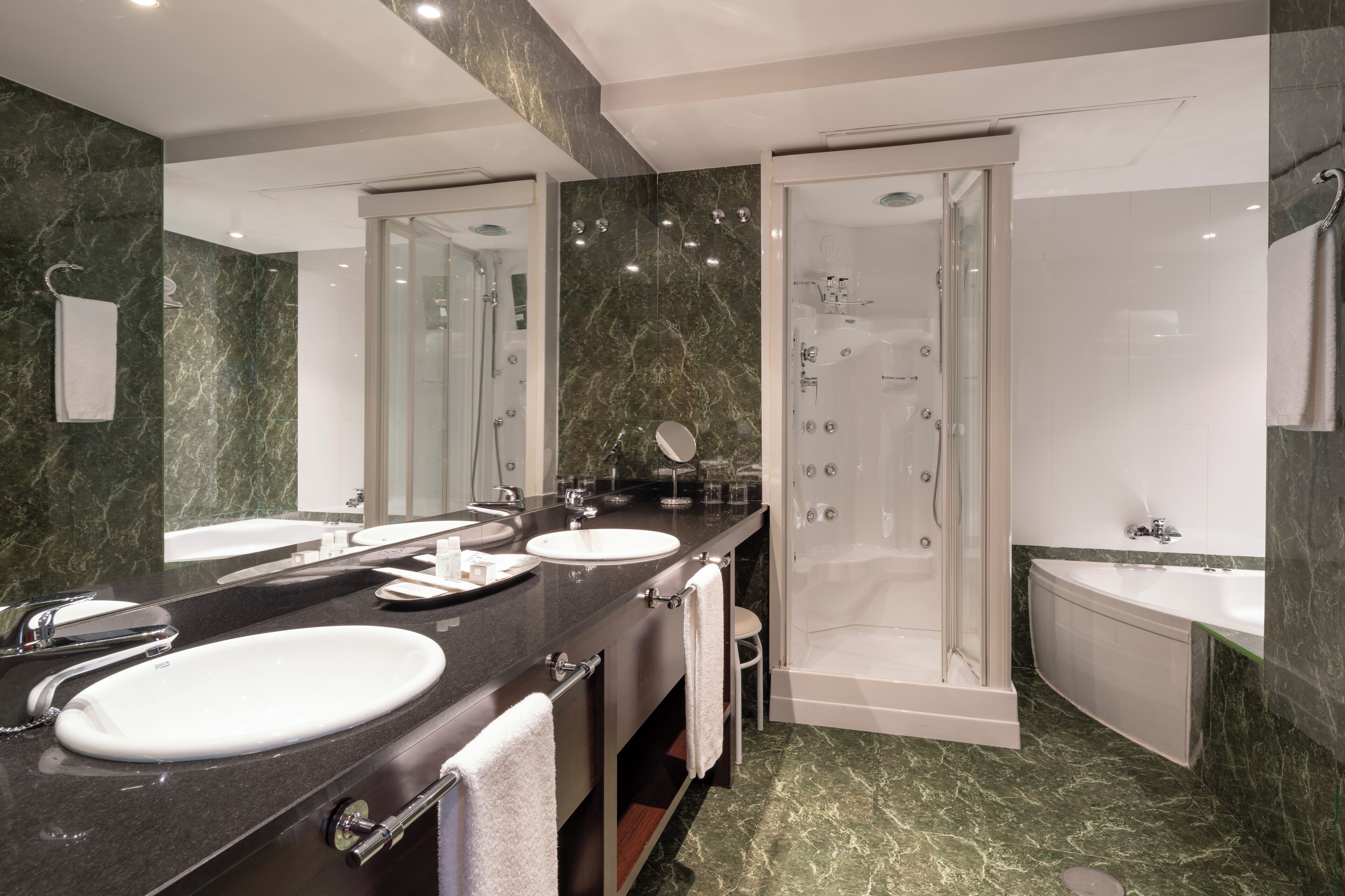 eco-friendly toiletries, hair dryer, bidet, towels