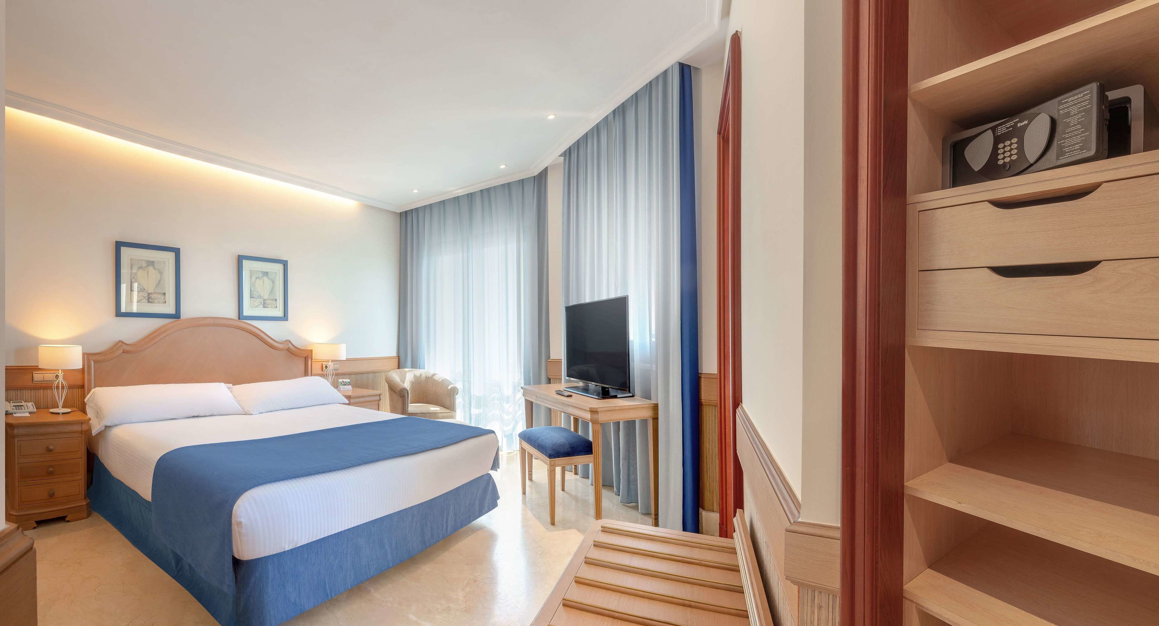 Biancheria da letto di alta qualità, minibar, una cassaforte in camera