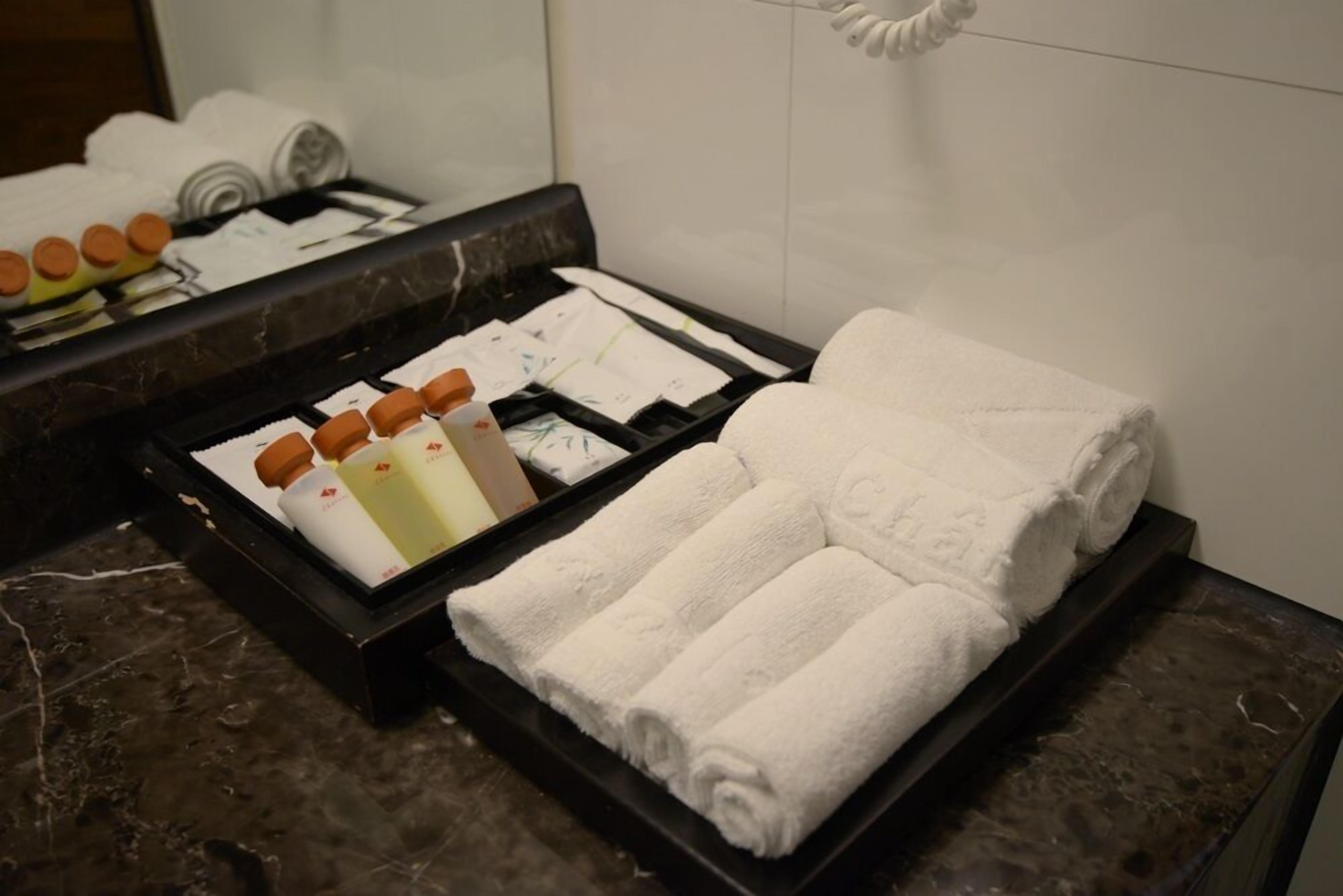 family room ocean view 2/3f | bathroom | hair dryer, slippers, towels, soap