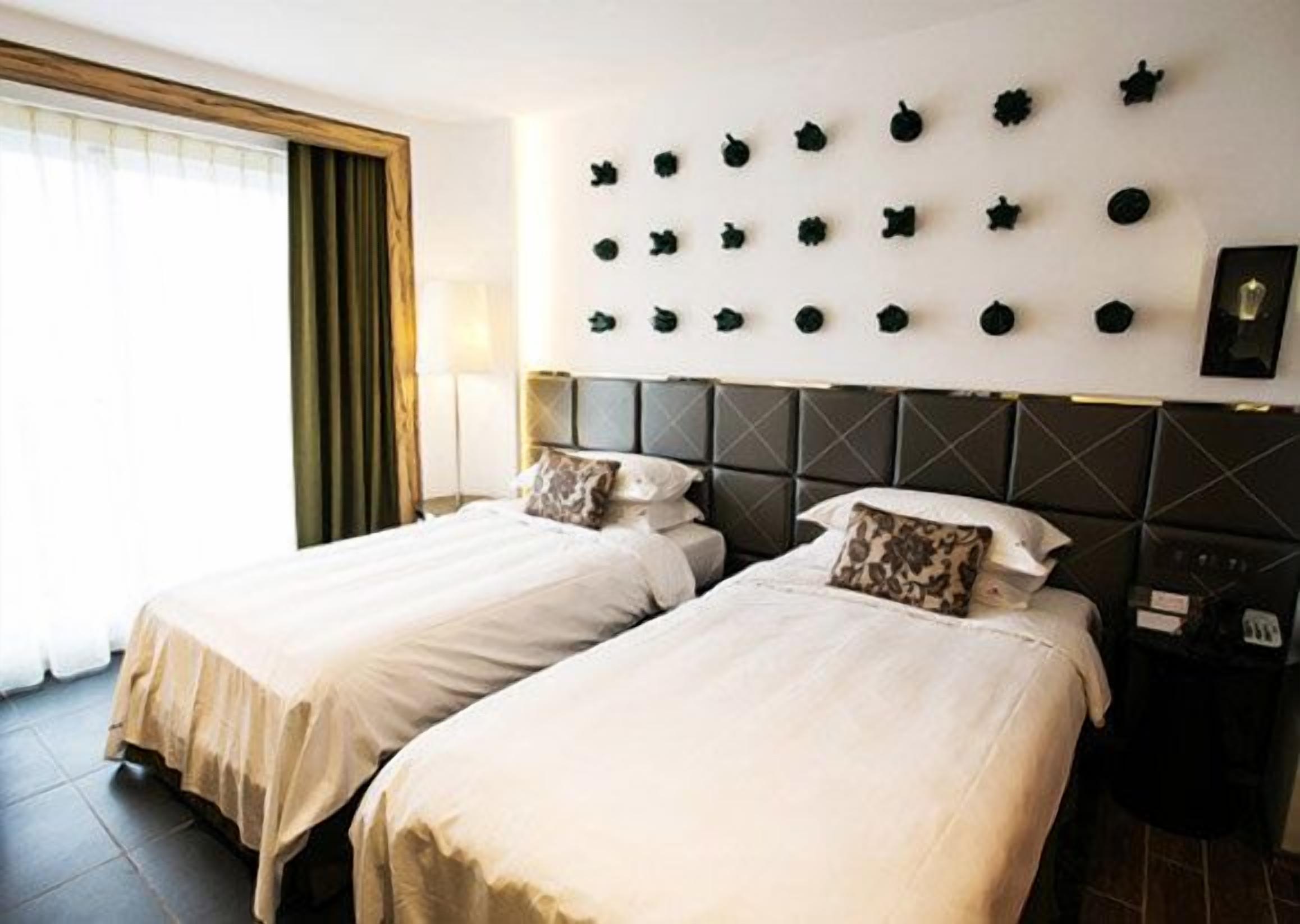 Hochwertige Bettwaren, Tempur-Pedic-Betten, Minibar, Zimmersafe