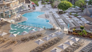 Indoor pool, 4 outdoor pools, open 10:00 AM to 6:00 PM, pool umbrellas