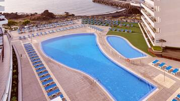 Indoor pool, 4 outdoor pools, open 10:00 AM to 6:00 PM, pool umbrellas