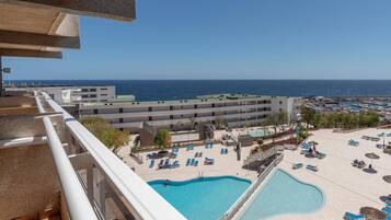 Indoor pool, 4 outdoor pools, open 10:00 AM to 6:00 PM, pool umbrellas