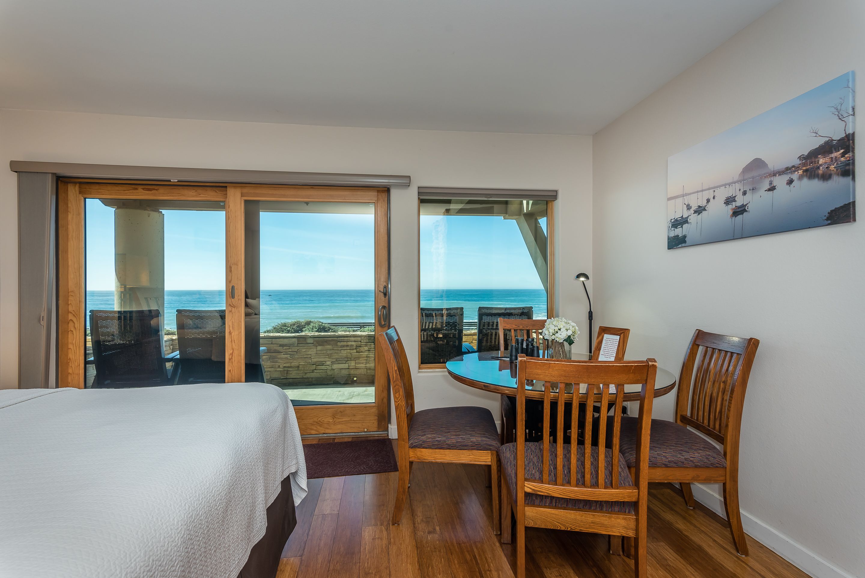 deluxe room, 2 queen beds, patio, ocean view | iron/ironing board, free cots/infant beds, free wifi, bed sheets