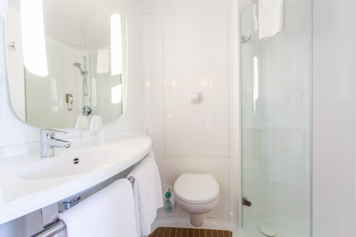 shower, eco-friendly toiletries, hair dryer, towels