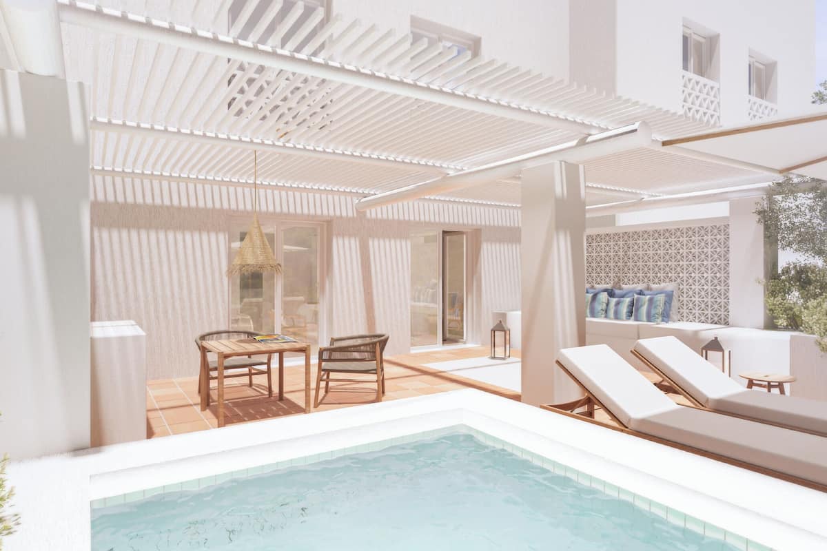 A modern outdoor pool area with lounge chairs, a table, and a pergola.