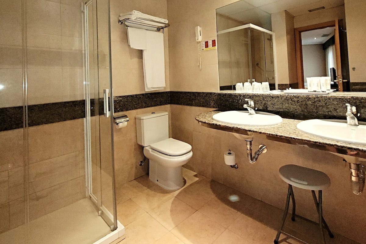 triple room | bathroom | hair dryer, towels