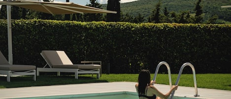 Seasonal outdoor pool, pool umbrellas