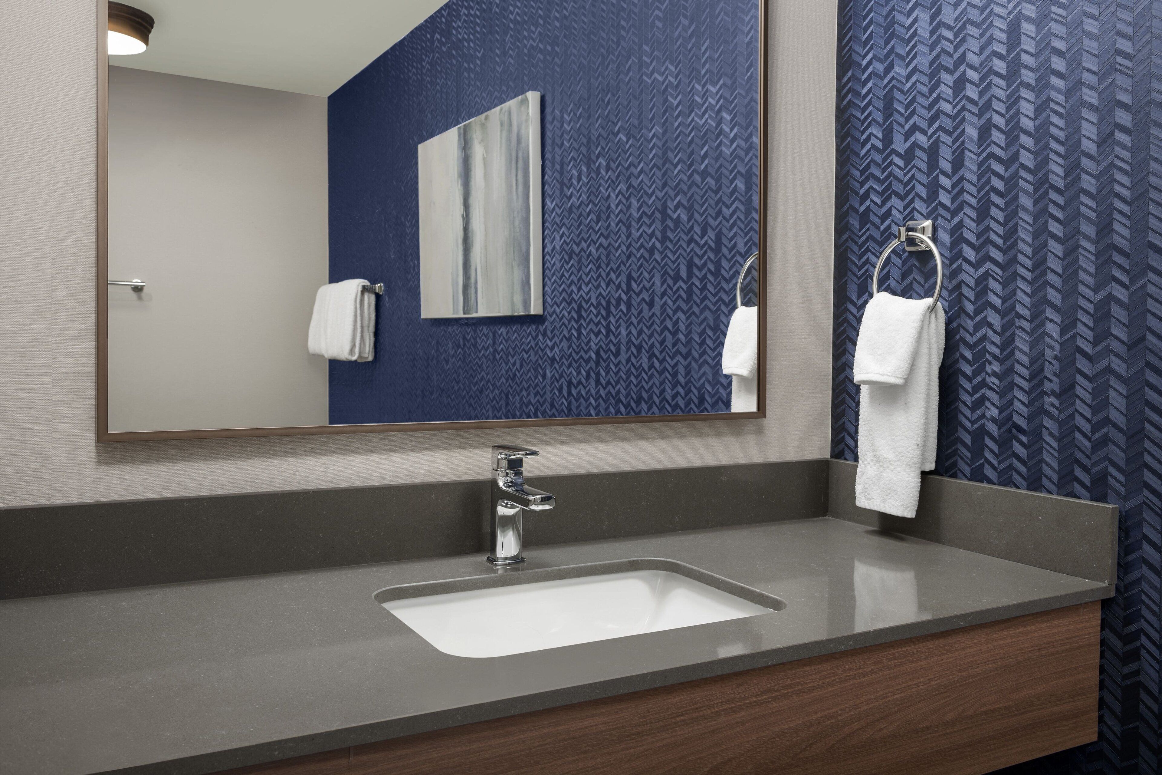 combined shower/bathtub, free toiletries, hair dryer, towels