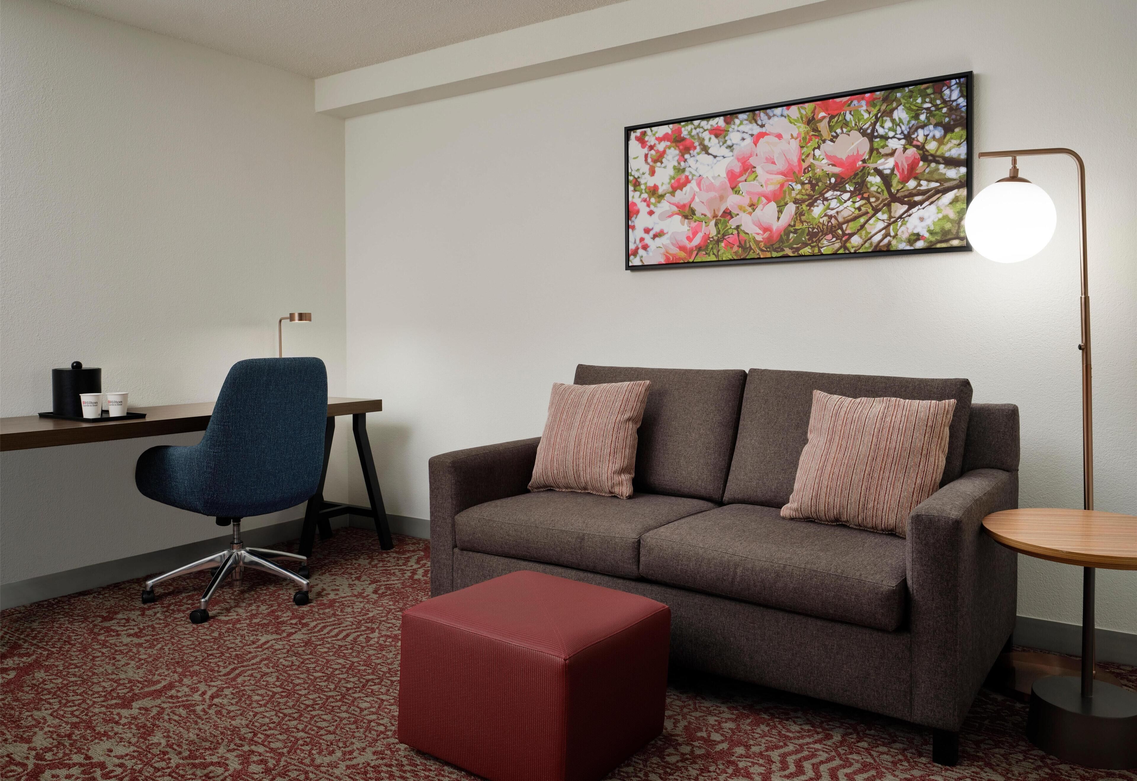 Suite, 1 King Bed | Living area | 37-inch flat-screen TV with cable channels, TV