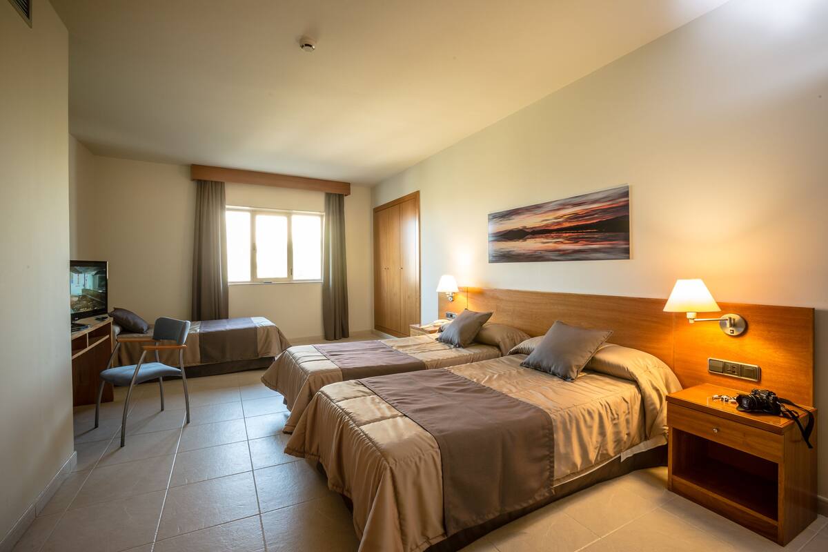Desk, soundproofing, rollaway beds (surcharge), WiFi (free)