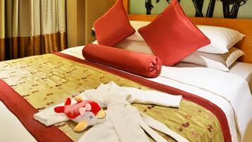 Premium bedding, down comforters, minibar, in-room safe