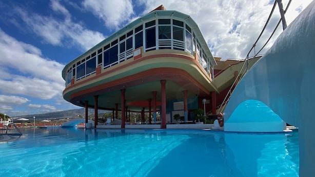 A multi-level building with a pool in the foreground. - Laguna Park 2 (Adeje)