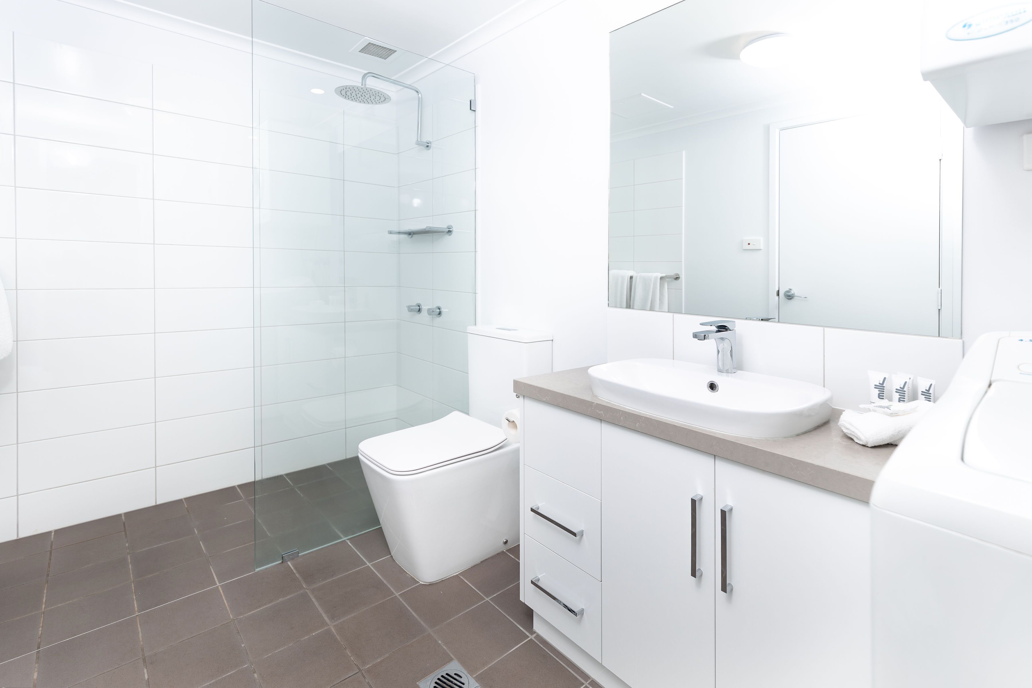 shower, free toiletries, hair dryer, towels