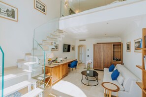 Premium bedding, down duvets, minibar, in-room safe