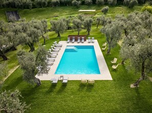 Seasonal outdoor pool, pool loungers