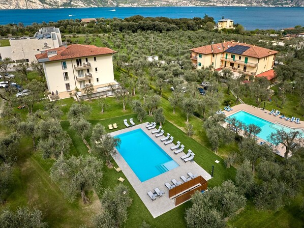 Seasonal outdoor pool, pool loungers