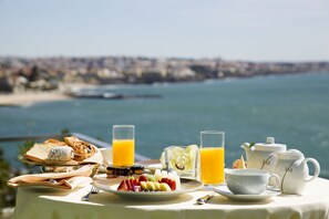 Enjoy a leisurely breakfast with a scenic coastal view.