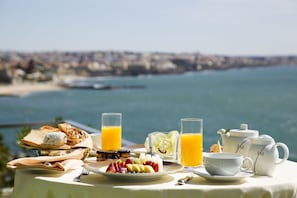 Enjoy a leisurely breakfast with a scenic coastal view.