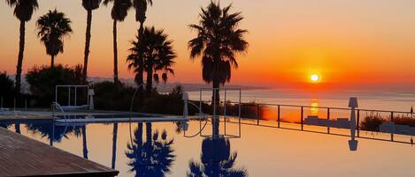 2 indoor pools, seasonal outdoor pool, pool umbrellas, pool loungers