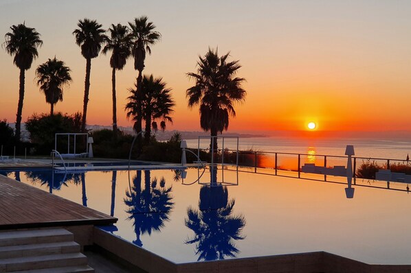 2 indoor pools, seasonal outdoor pool, pool umbrellas, sun loungers