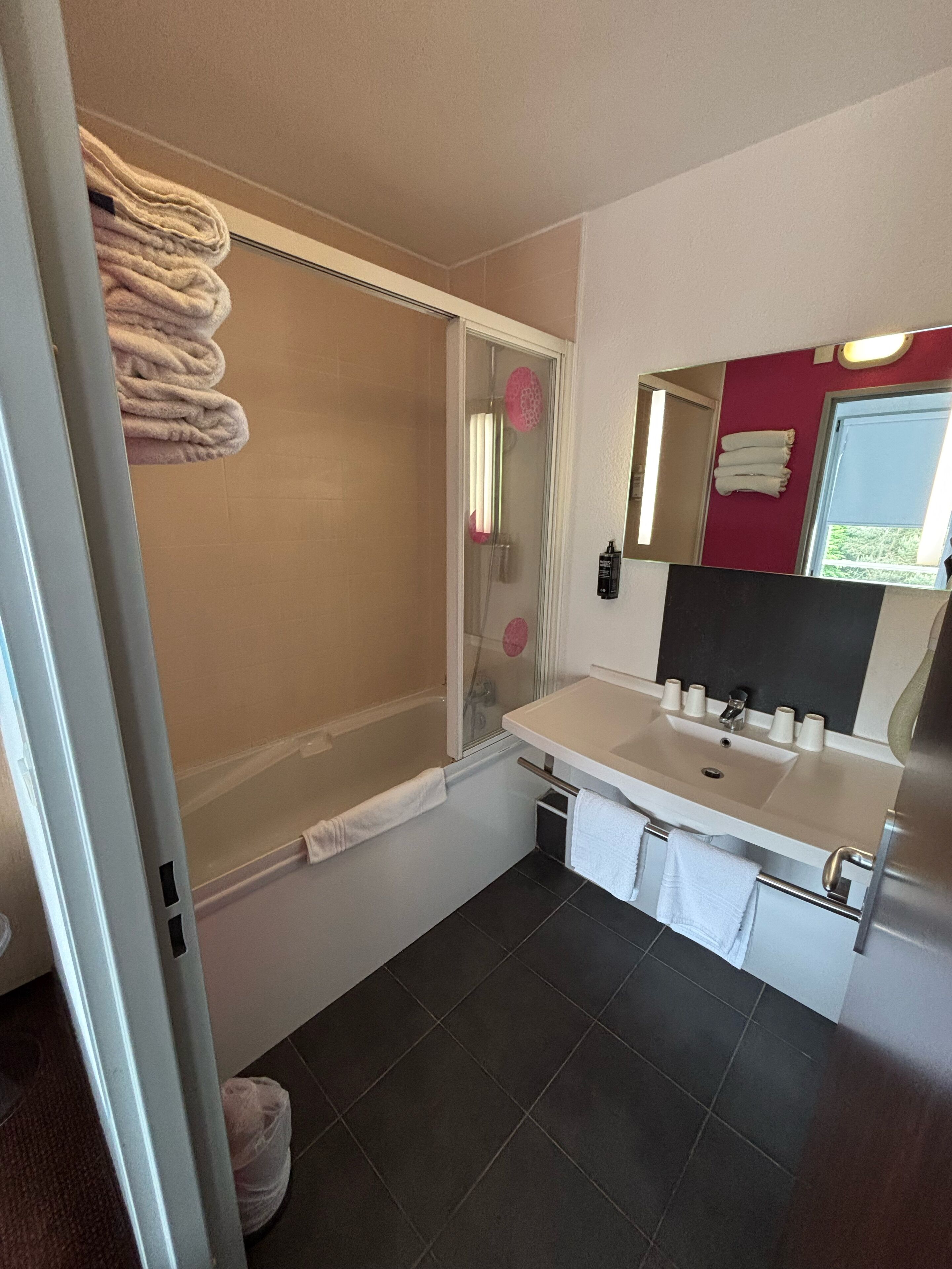 standard suite, multiple beds | bathroom | eco-friendly toiletries, hair dryer, towels
