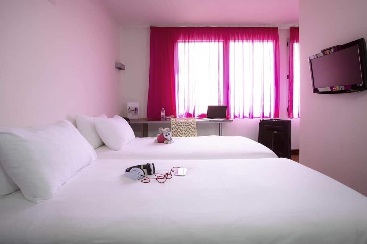 Standard Suite, Multiple Beds | Laptop workspace, soundproofing, iron/ironing board, free WiFi