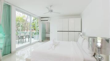 Three-Bedroom Apartment | In-room safe, desk, blackout drapes, iron/ironing board