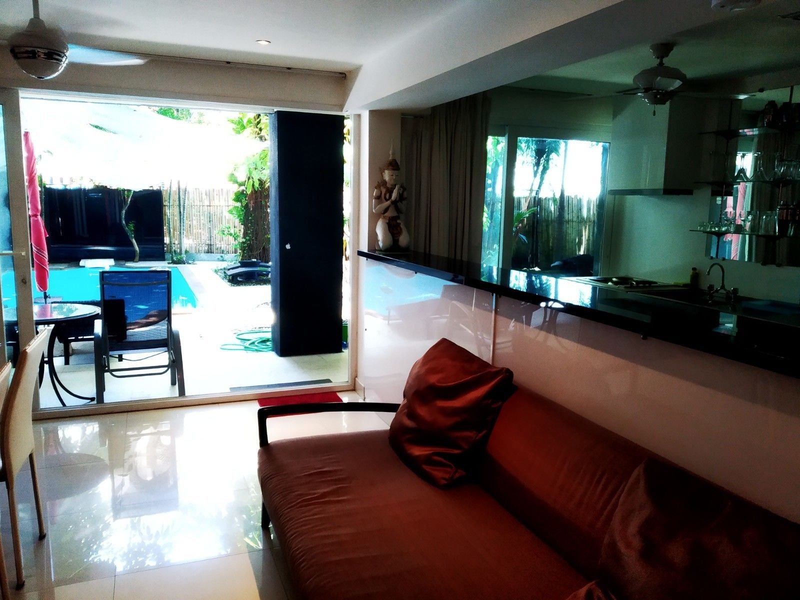 Comfort Condo, Pool View | Living room | 44-inch LCD TV with cable channels, TV, DVD player