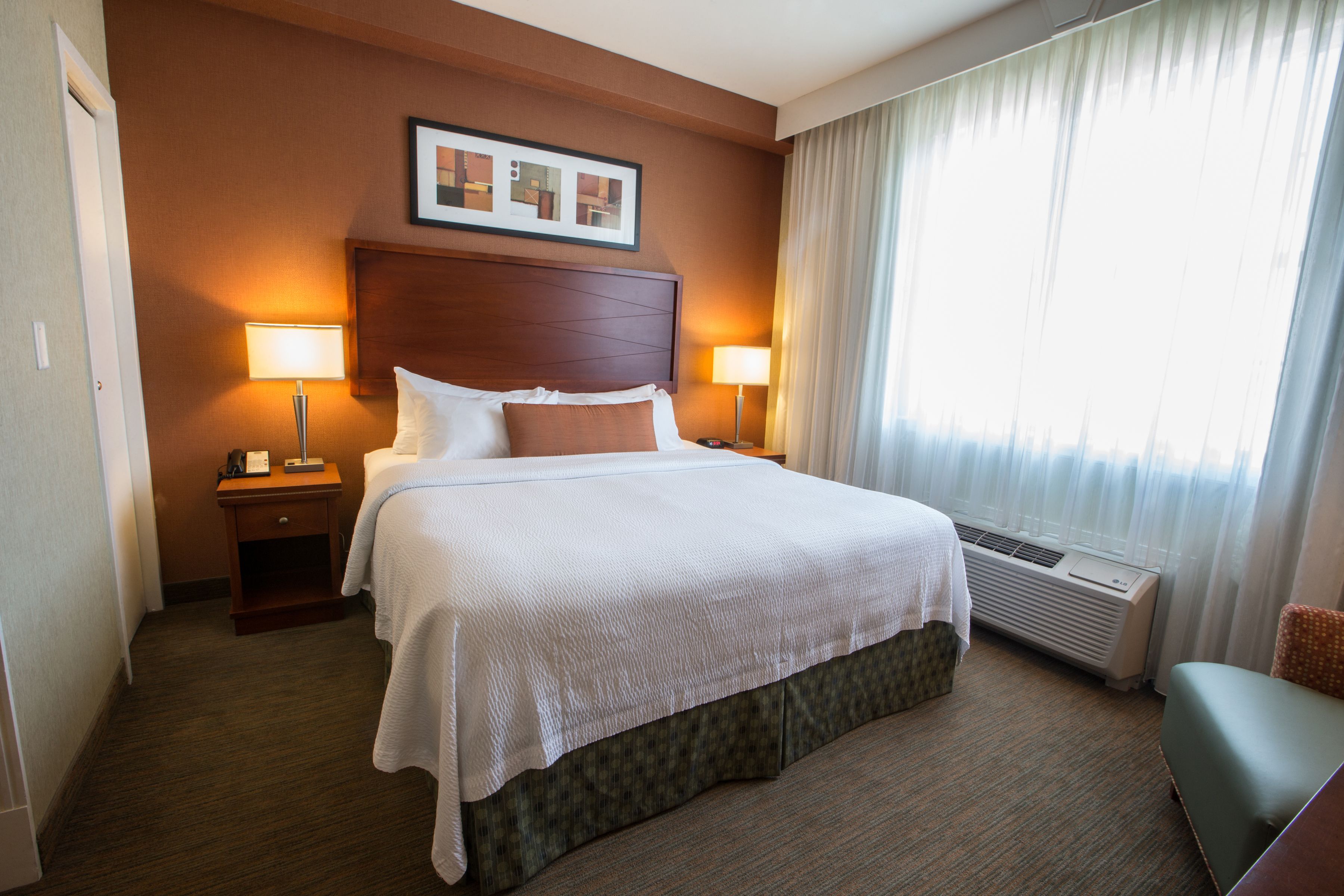 Premium bedding, pillowtop beds, desk, blackout drapes