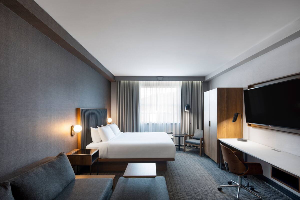 junior suite, 1 king bed with sofa bed, non smoking (harbour view) | premium bedding, pillow-top beds, desk, blackout curtains