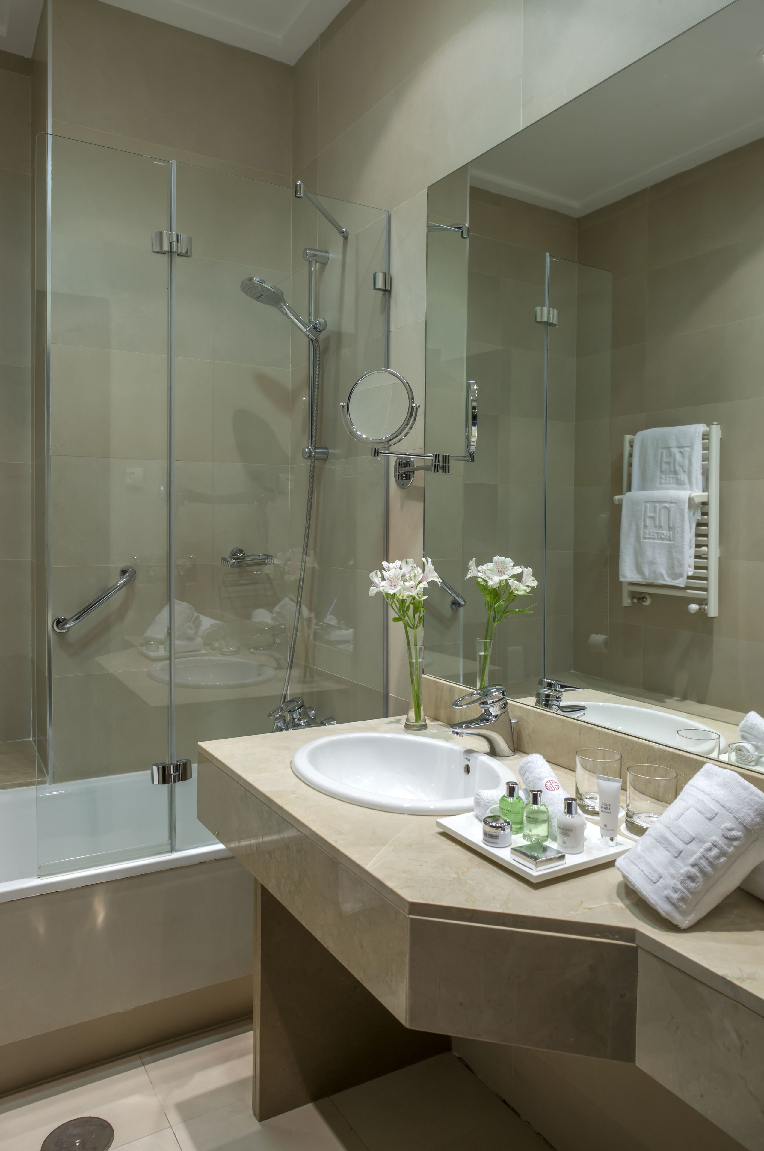 deep-soaking bathtub, rainfall showerhead, eco-friendly toiletries