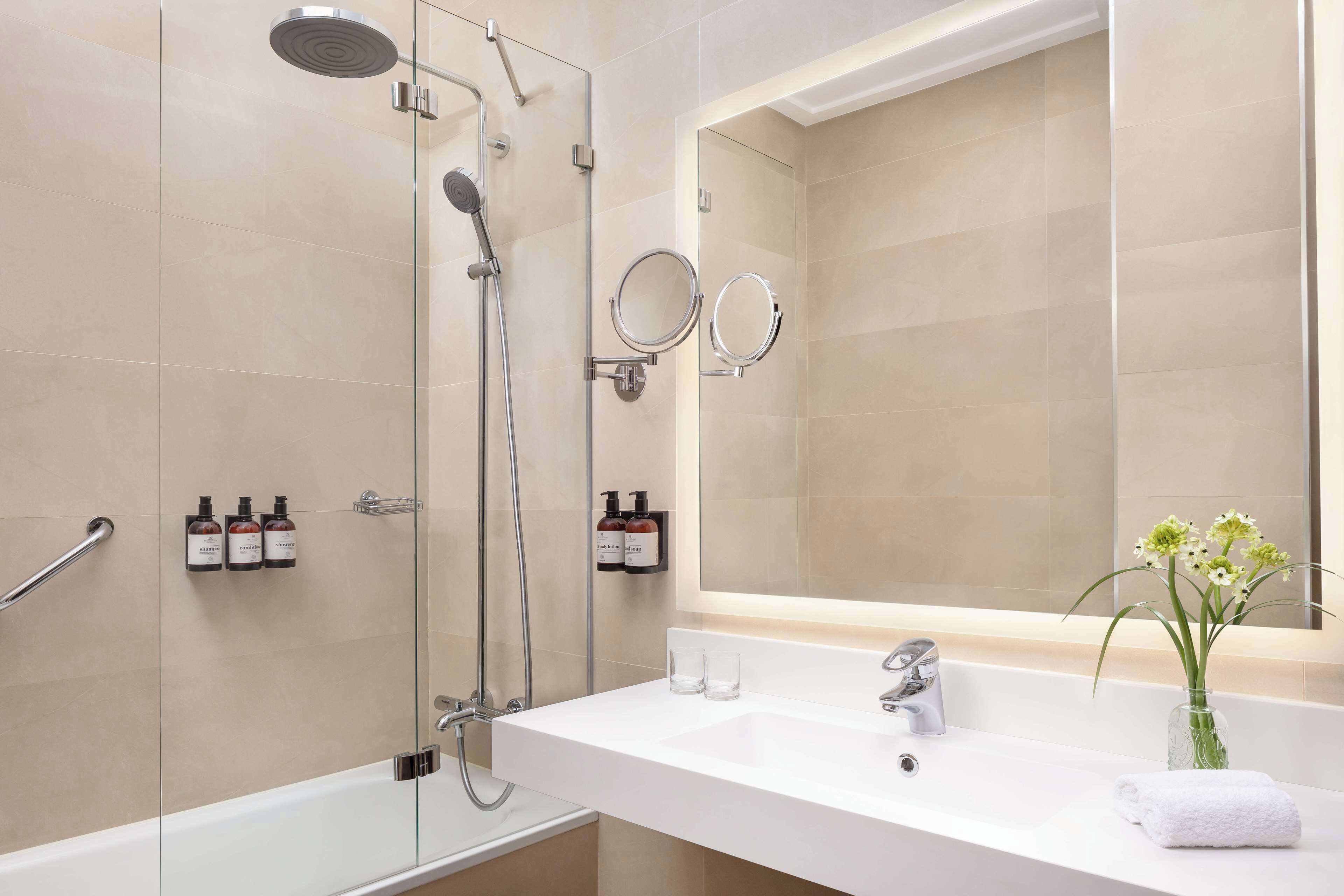 deep-soaking bathtub, rainfall showerhead, eco-friendly toiletries