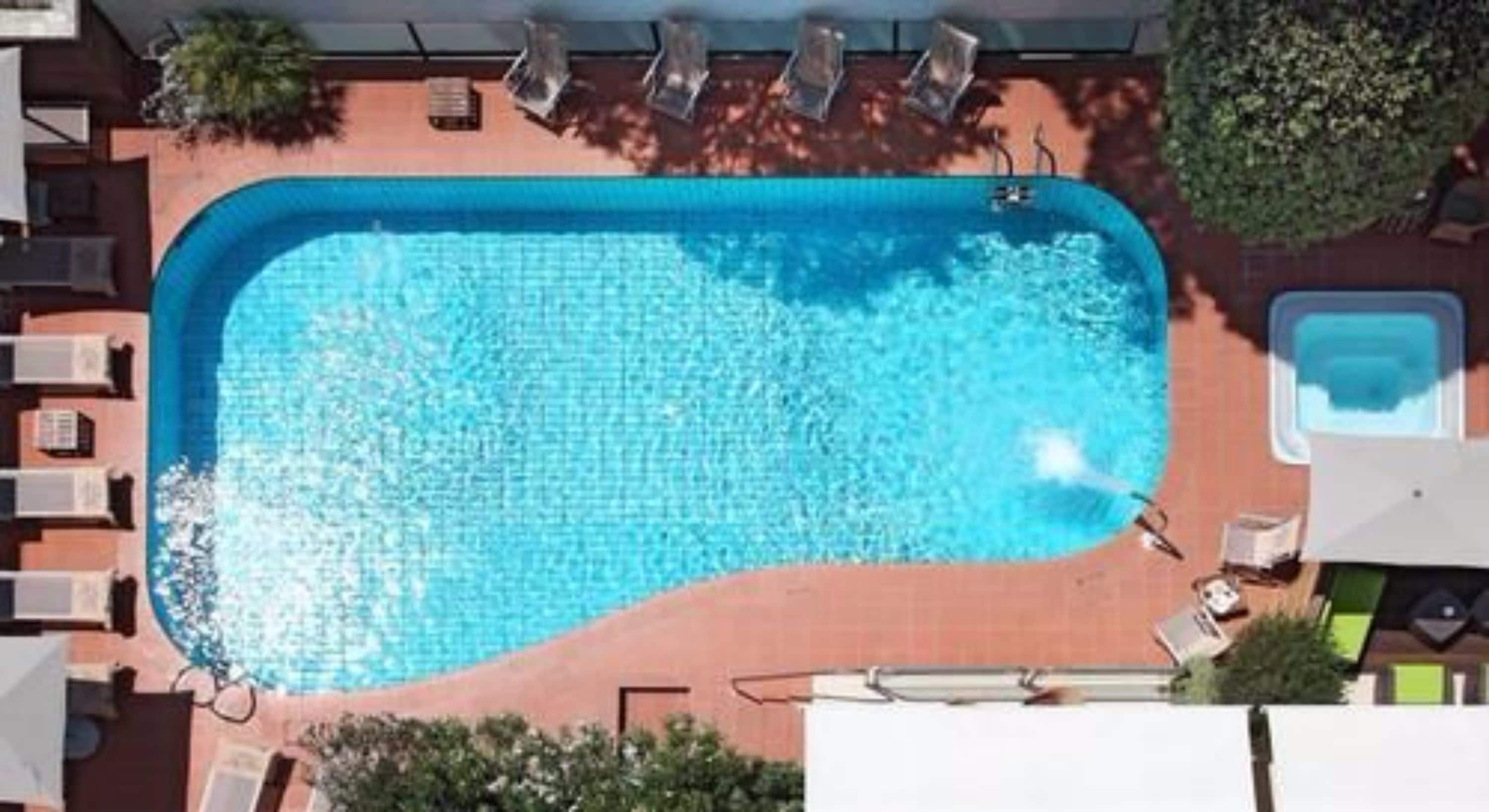 seasonal outdoor pool, pool umbrellas, pool loungers