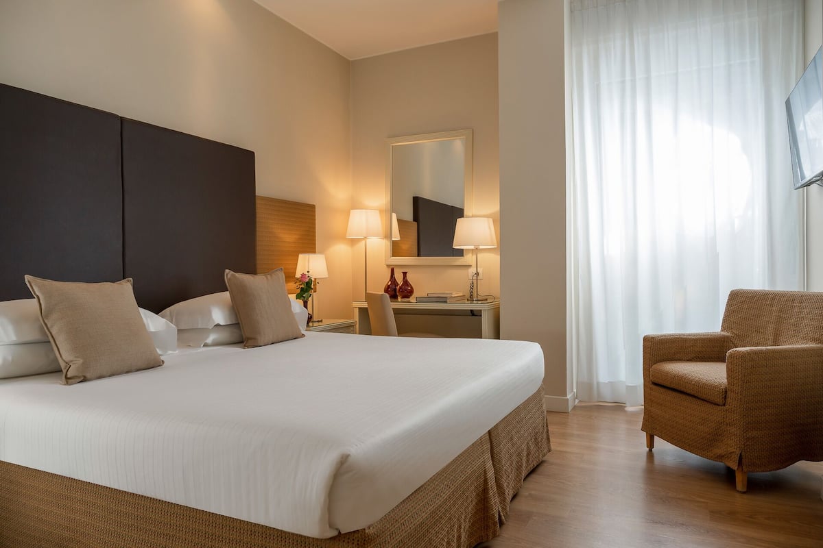Premium bedding, minibar, in-room safe, individually decorated