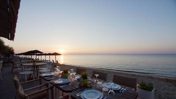 Breakfast, lunch, dinner served; beach views