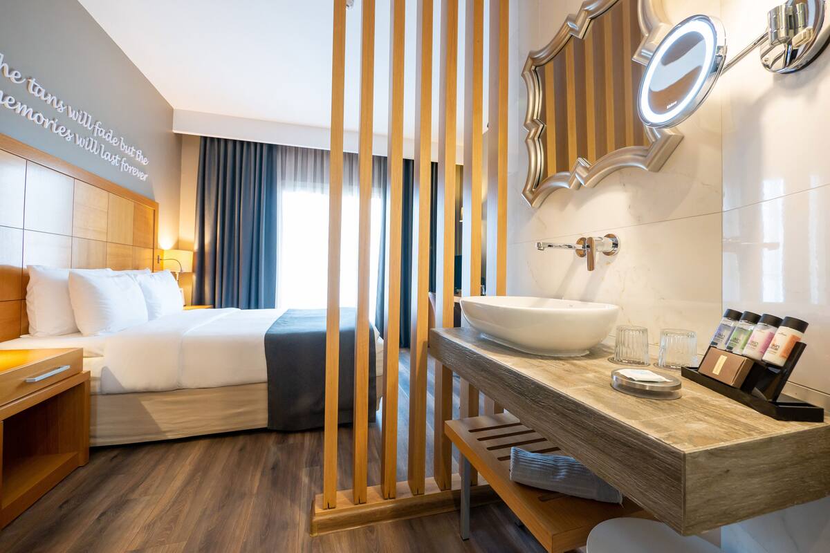 standard coco-mat room back view | 1 bedroom, minibar, in-room safe, desk