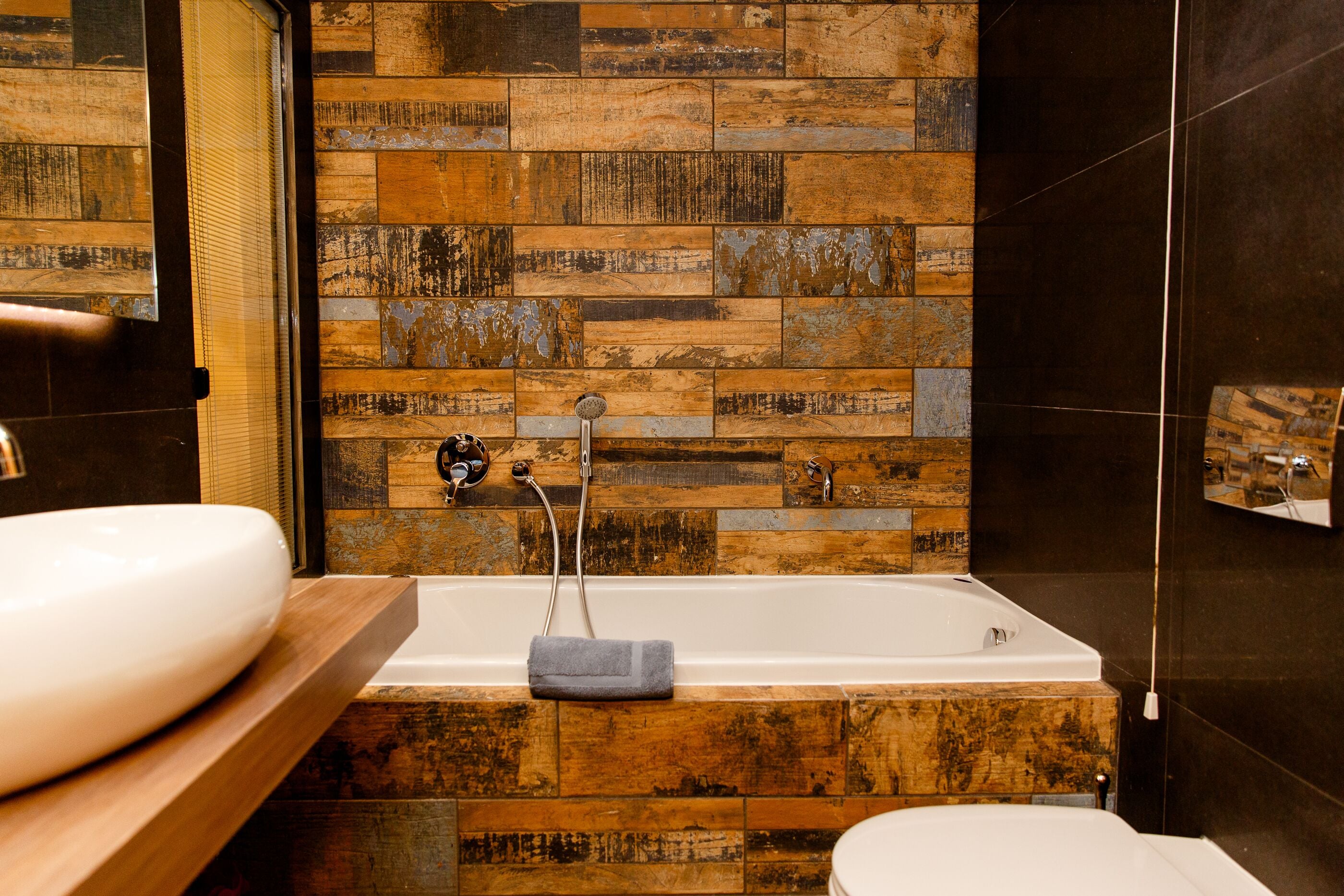 hephaestus coco-mat suite front sea view | bathroom | shower, free toiletries, hair dryer, slippers