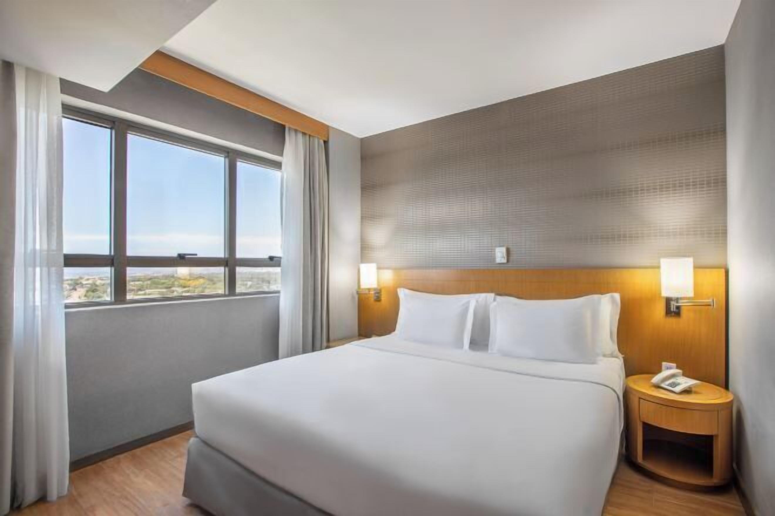 Hypo-allergenic bedding, minibar, in-room safe, individually decorated