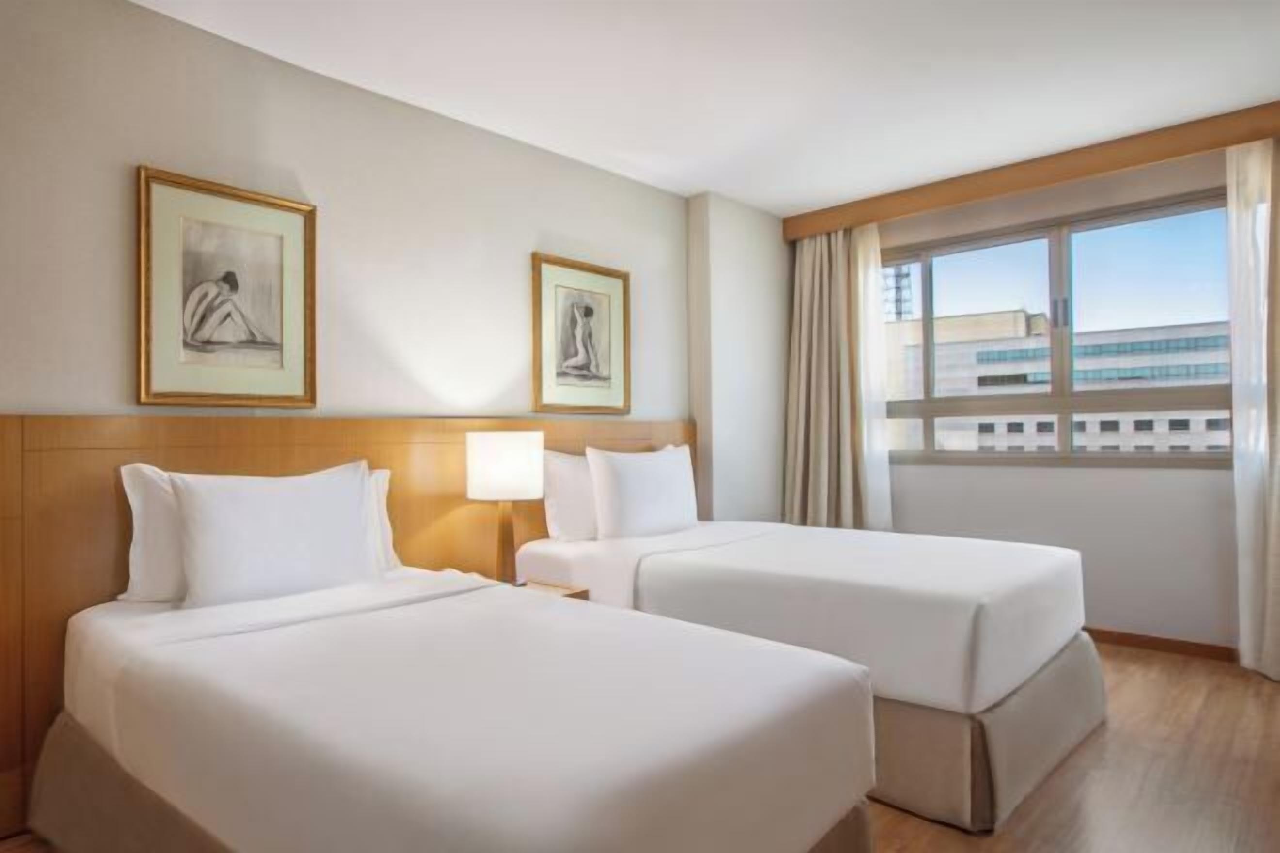 Hypo-allergenic bedding, minibar, in-room safe, individually decorated