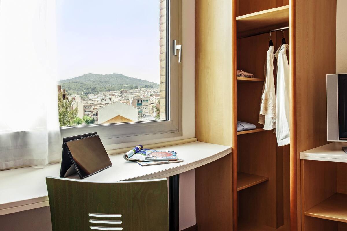 room (new bedding) | down duvets, desk, blackout curtains, soundproofing