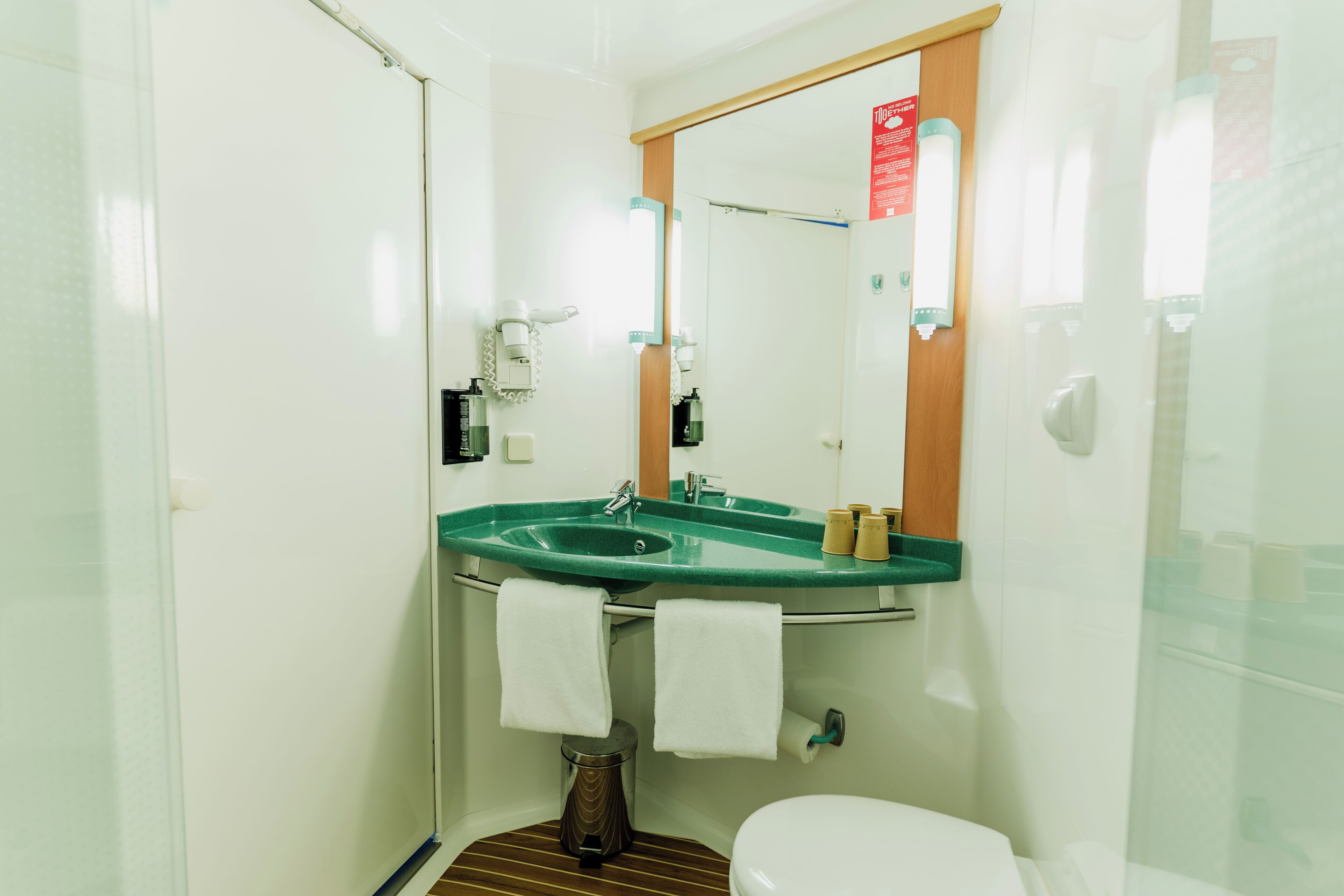 Shower, eco-friendly toiletries, hair dryer, towels