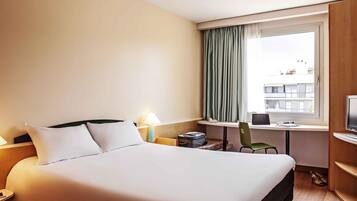 Down comforters, desk, blackout drapes, soundproofing