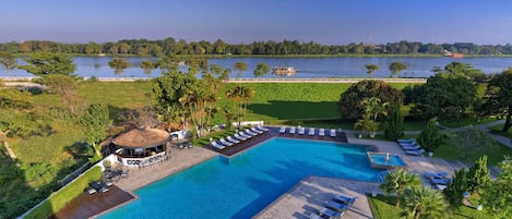 Outdoor pool, pool umbrellas, sun loungers