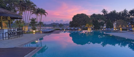 Outdoor pool, pool umbrellas, sun loungers